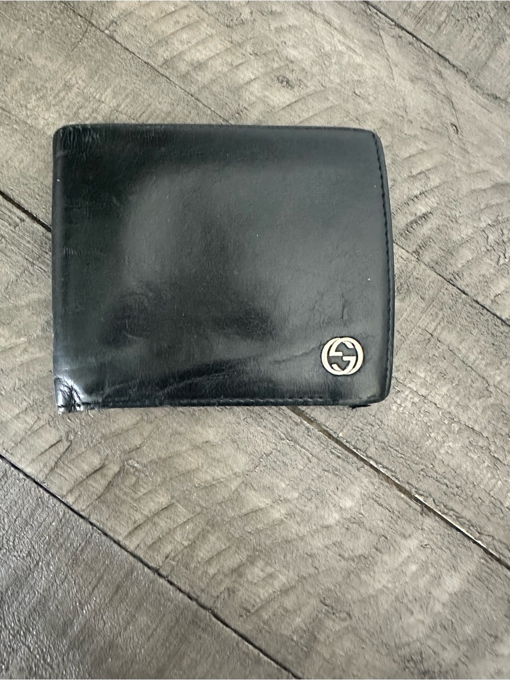 Men's Vintage Black Leather Bi-Fold Wallet with Silver Gucci Emblem